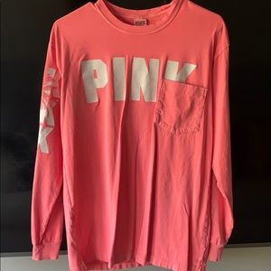 Pink long sleeve t shirt.